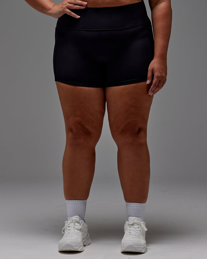 Woman wearing Fusion X-Short Tight With Pockets in Black | Model:Jordie | Size:2XL
