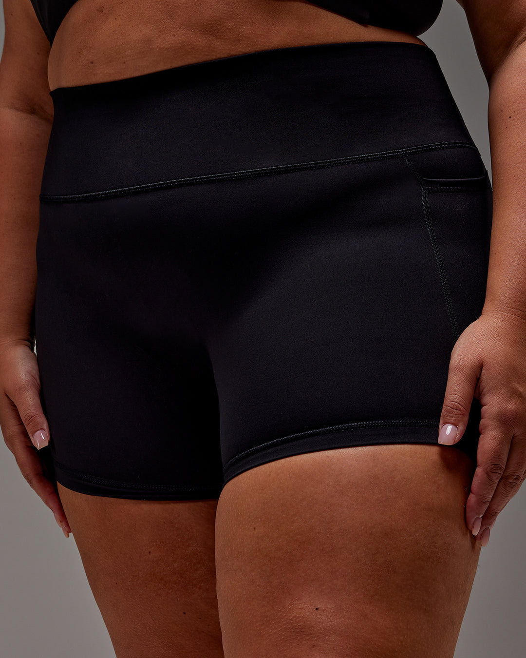 Woman wearing Fusion X-Short Tight With Pockets in Black | Model:Jordie | Size:2XL