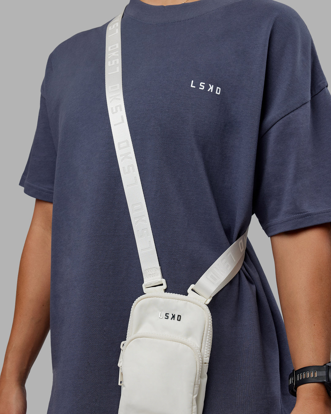 Abs On The Go Phone Sling - Off White