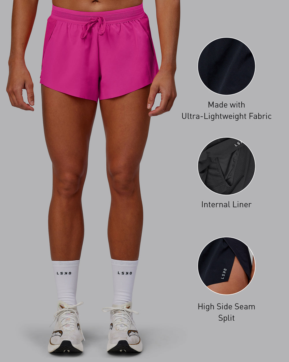 Woman wearing Accelerate Run Shorts - Ultra Pink