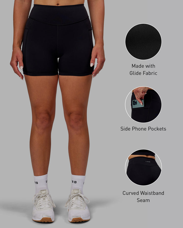 Woman wearing Elite X-Length Shorts - Black
