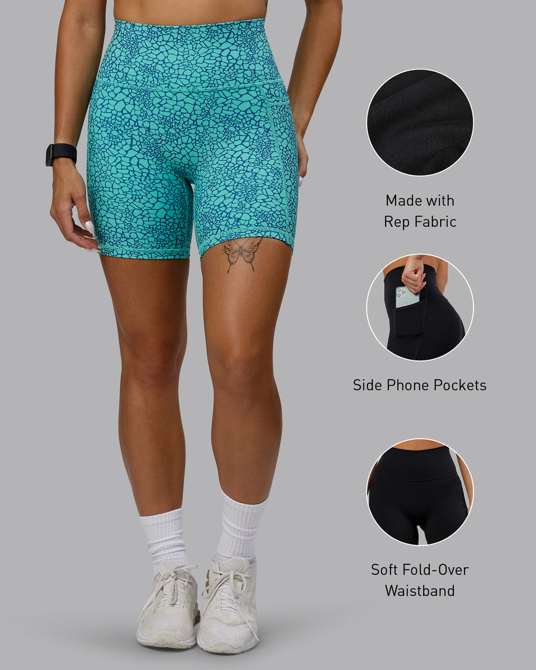 Woman wearing Fusion Mid Short Tights - Aquatic Awe Vitality Print