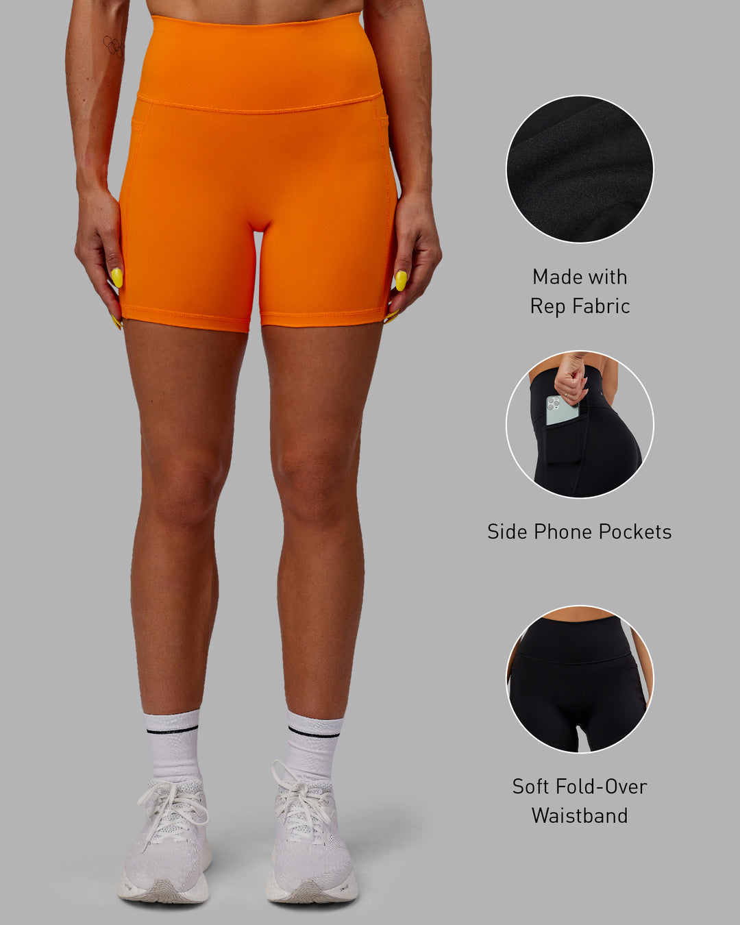 Woman wearing Fusion Mid Short Tights - Vibrant Orange