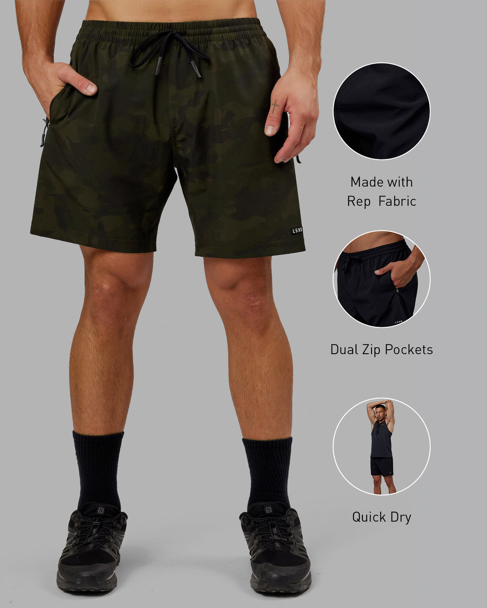 Man wearing Rep 7" Performance Short - Dark Olive Camo