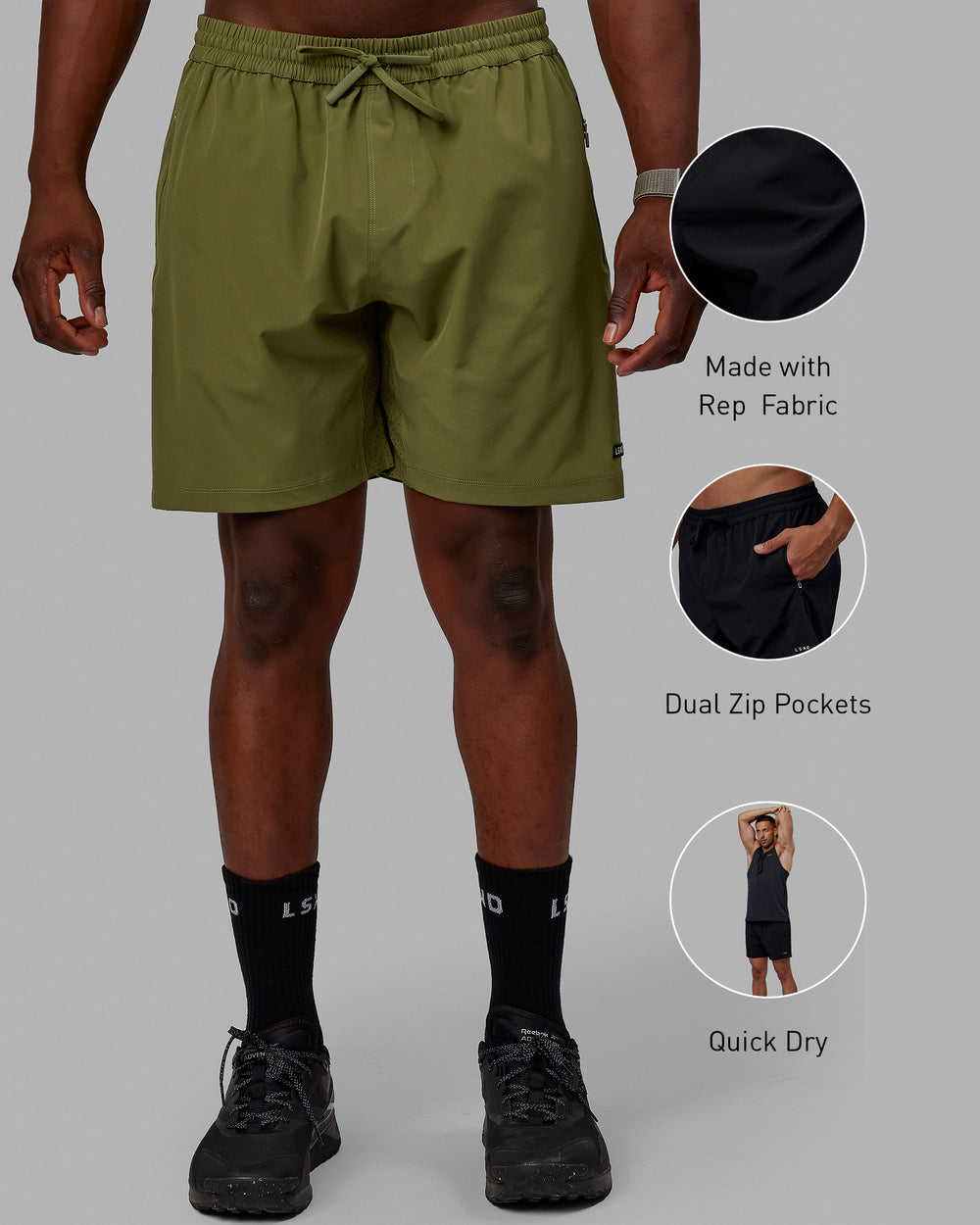 Man wearing Rep 7'' Performance Shorts - Moss