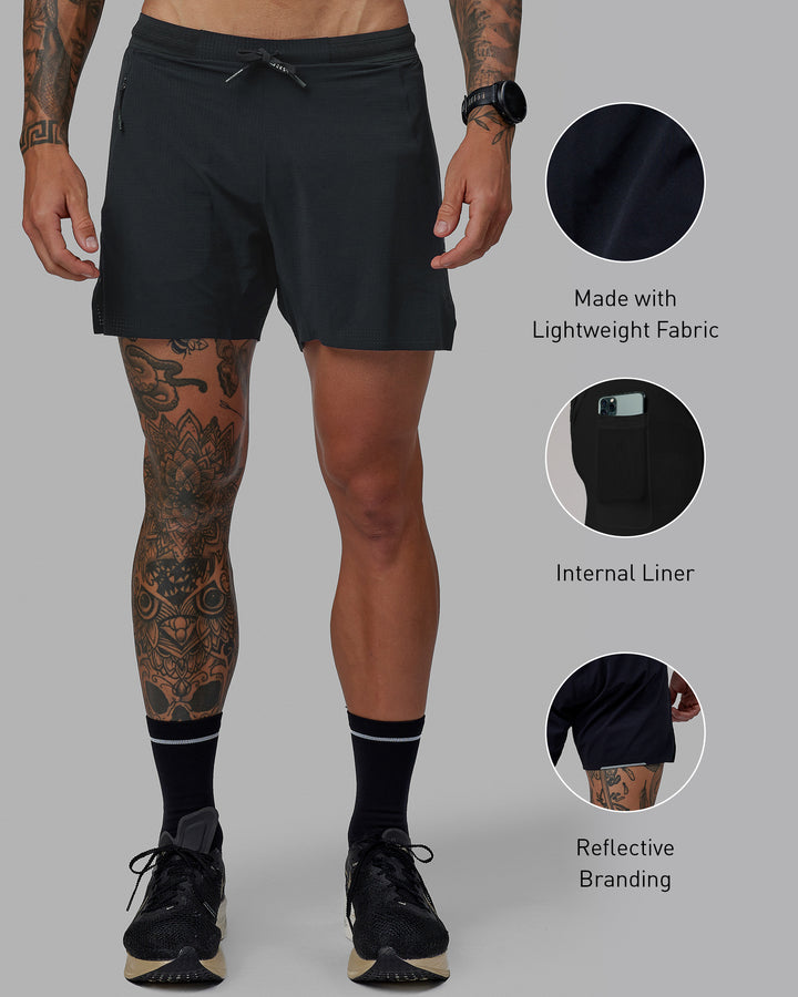 Man wearing UltraAir 5&quot; Lined Performance Shorts - Pirate Black
