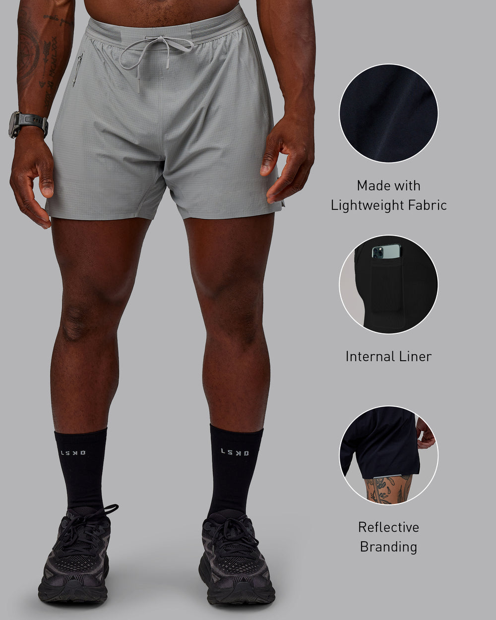 Man wearing UltraAir 5" Lined Performance Shorts - Circular Grey