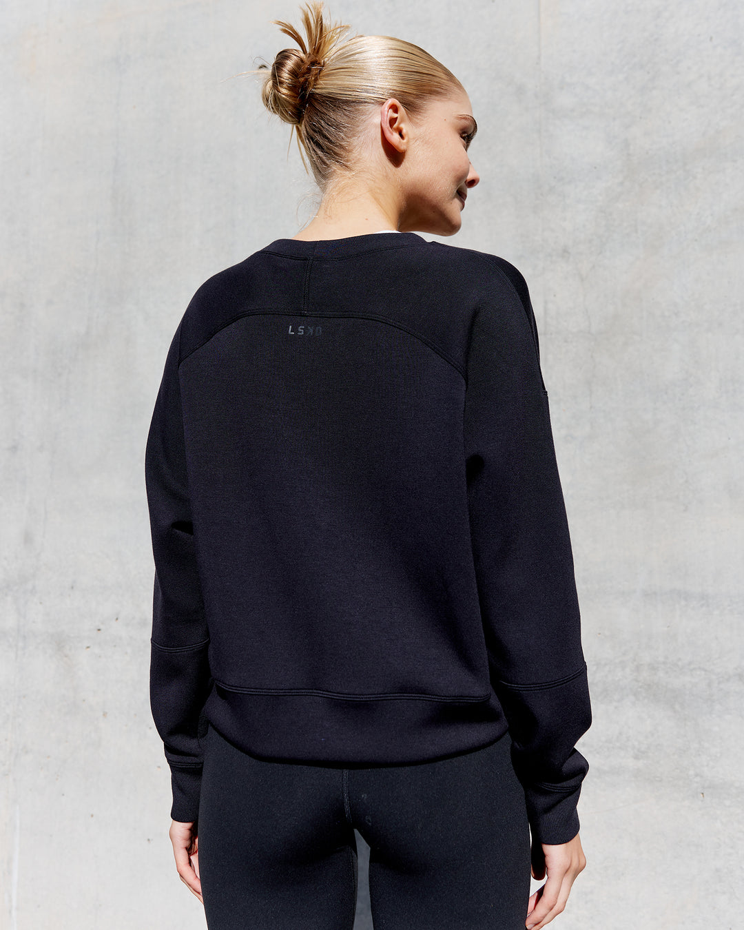 Woman wearing Elevate SoftTouch Crew Neck Sweater - Black-Blac