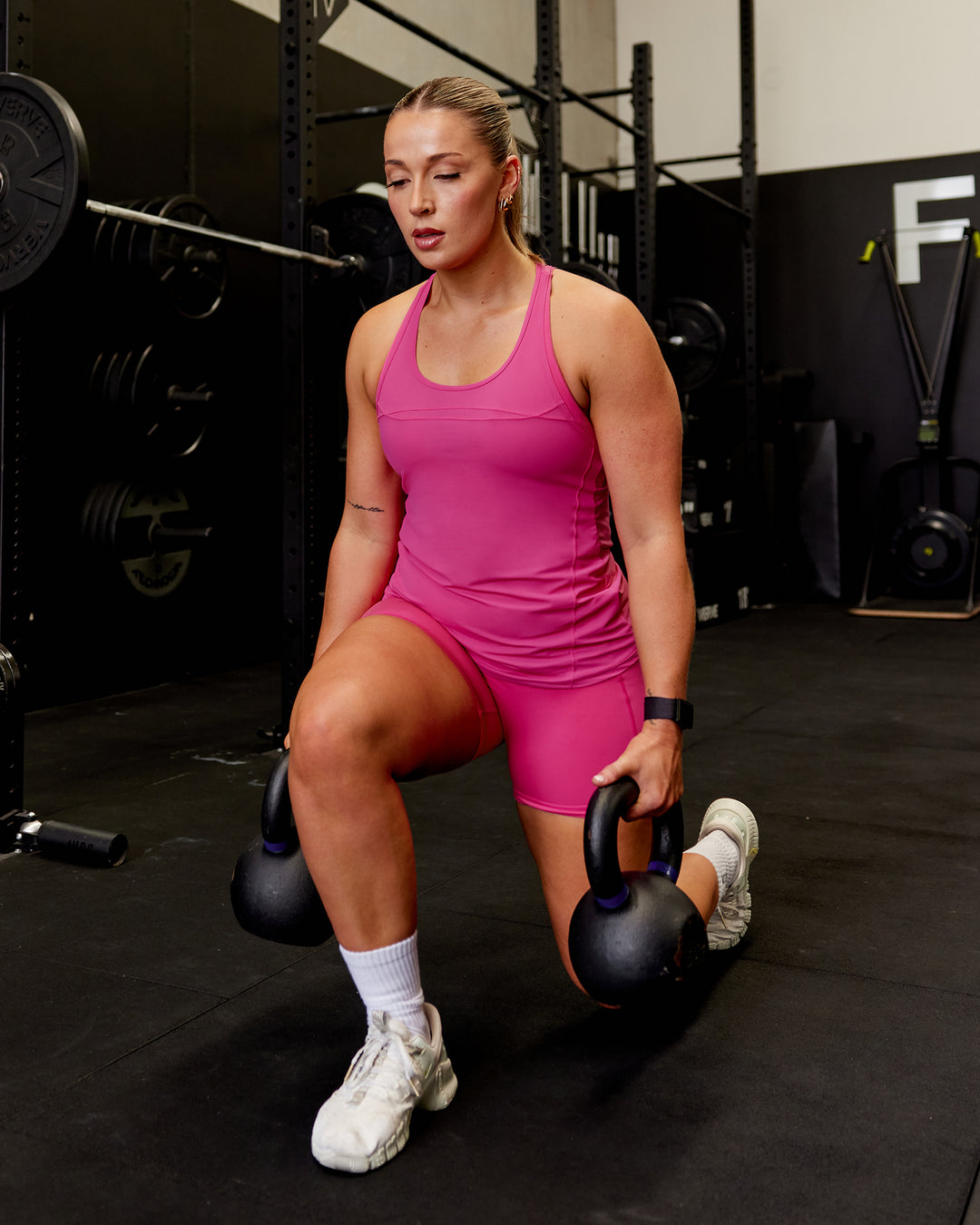 Woman wearing Endorphin Rush Tank - Fuchsia Pink