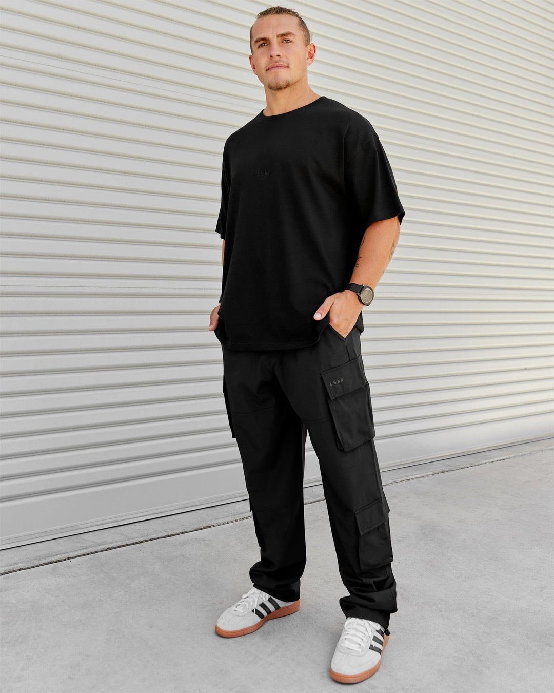 Man wearing Energy Stretch Relaxed Fit Cargo Pants - Black