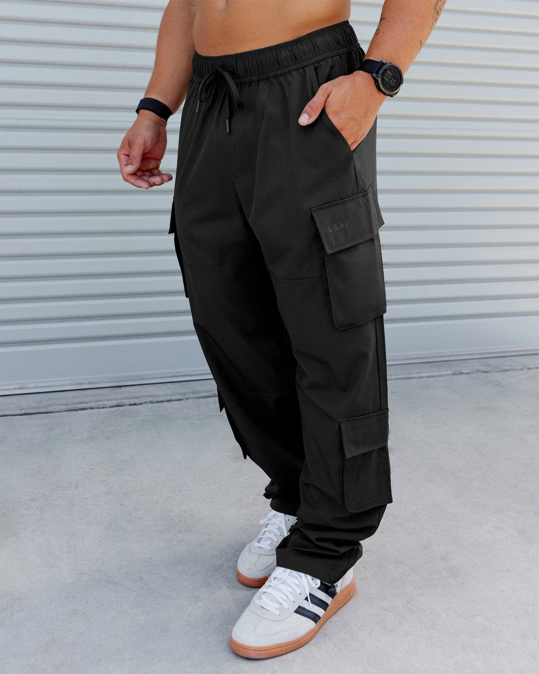 Man wearing Energy Stretch Relaxed Fit Cargo Pants - Pirate Black