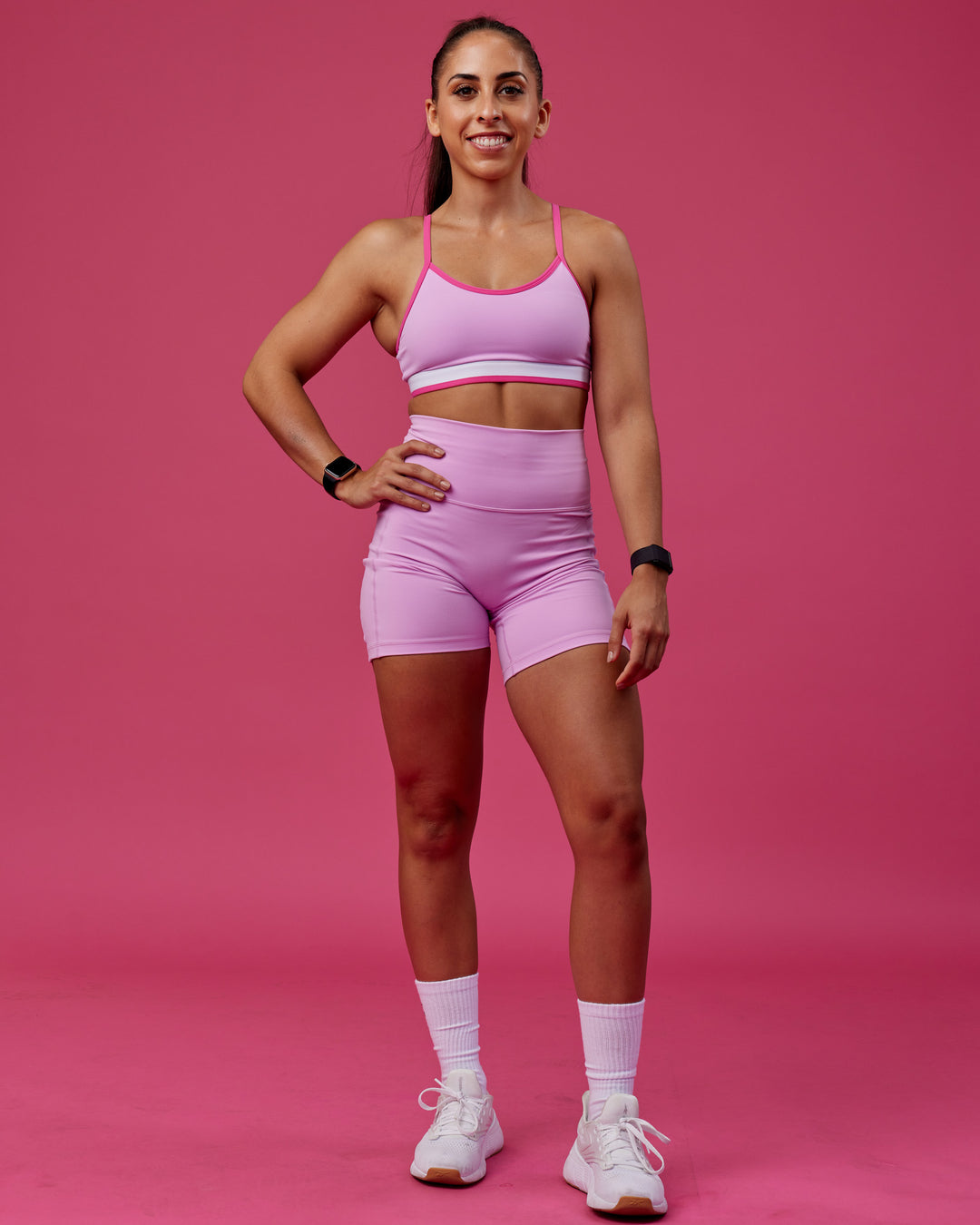 Woman wearing Excel Sports Bra - Pastel Orchid