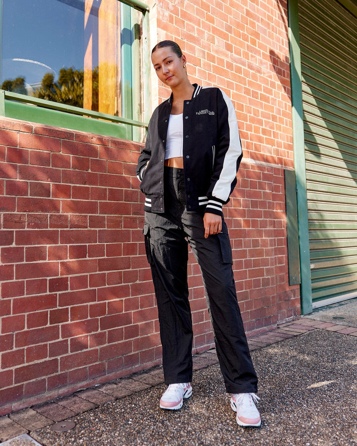 Woman wearing Unisex Fitness Club Bomber Jacket - Black-Off White
