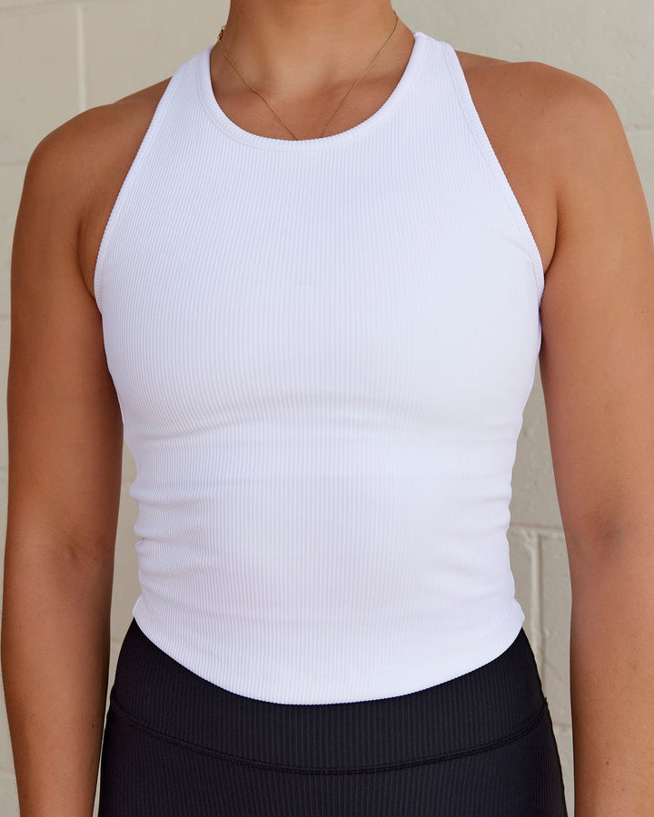 Woman wearing Flow Ribbed Shelf Bra Tank - White
