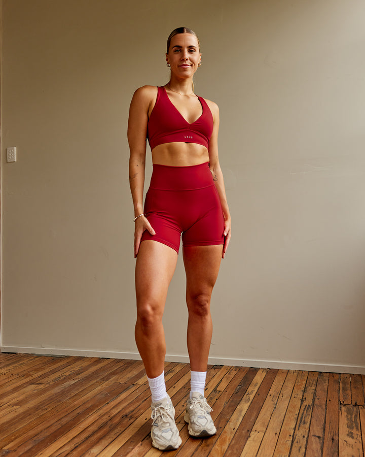 Woman wearing Fusion Mid Short Tights with Pockets - Cherry Red
