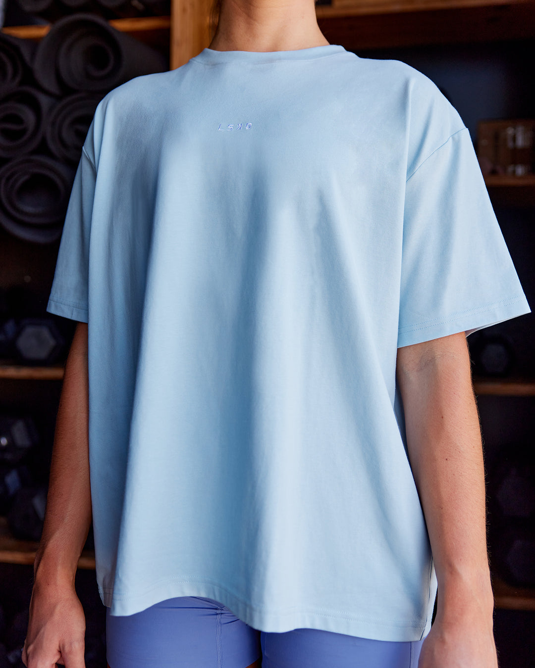 Woman wearing Go-To FLXCotton Oversized Tee - Glacial Blue-White