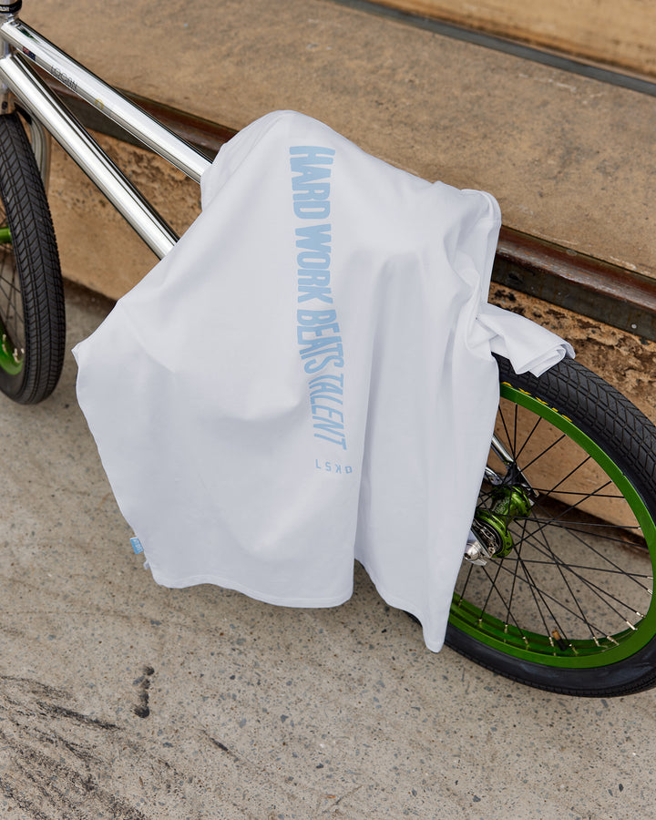 Man wearing LSKD x Logan Martin FLXCotton Tee Oversize - White-Windsurfer
