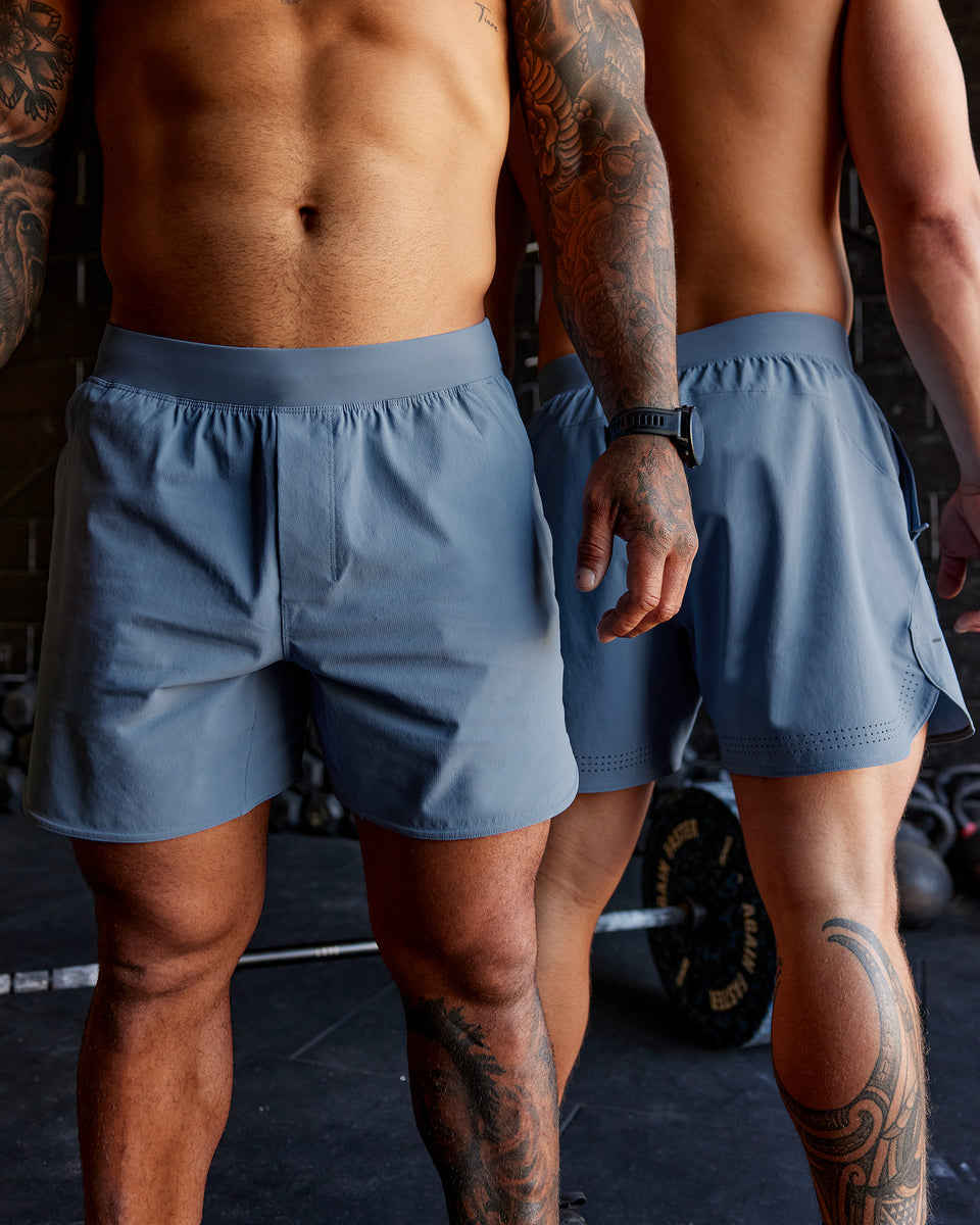 Man wearing Lift 6" Performance Shorts - Elemental Blue