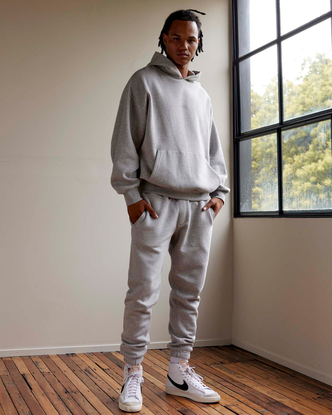 Man wearing MVP Track Pants - Lt Grey Marl