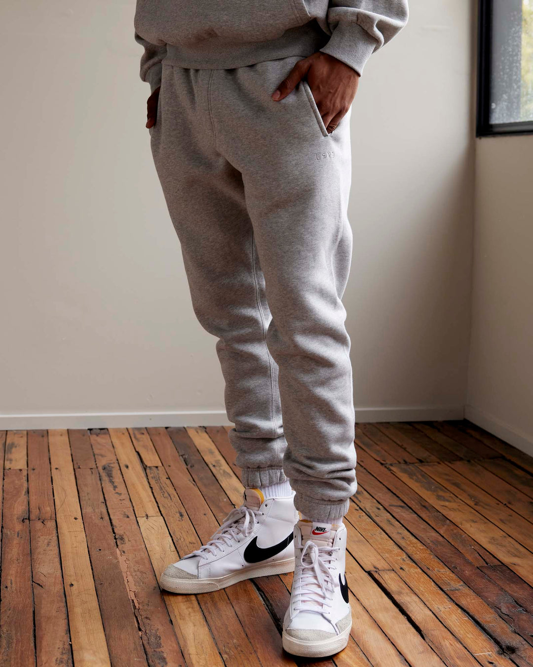 Man wearing MVP Track Pants - Lt Grey Marl