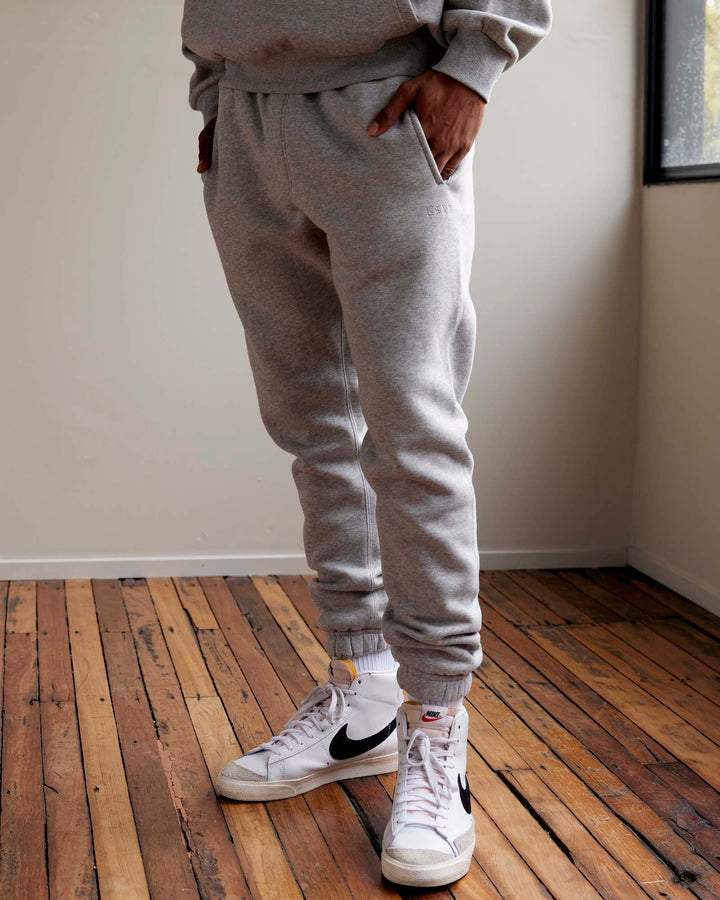 Man wearing MVP Track Pants - Lt Grey Marl
