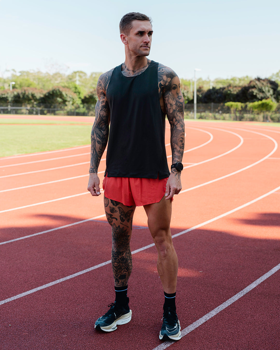 Man wearing Race Day 3&quot; Lined Running Shorts - Cayenne