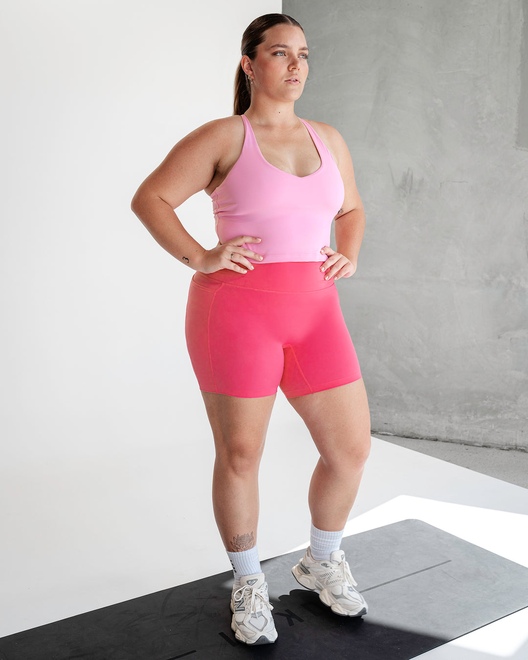 Woman wearing Movement Active Tank - Bubblegum