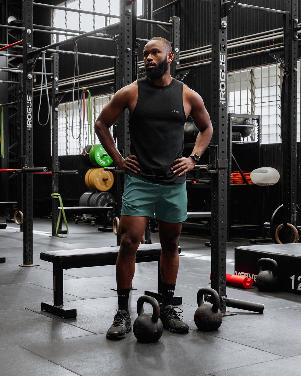 Man wearing Rep 5" Performance Shorts - Sage Bush