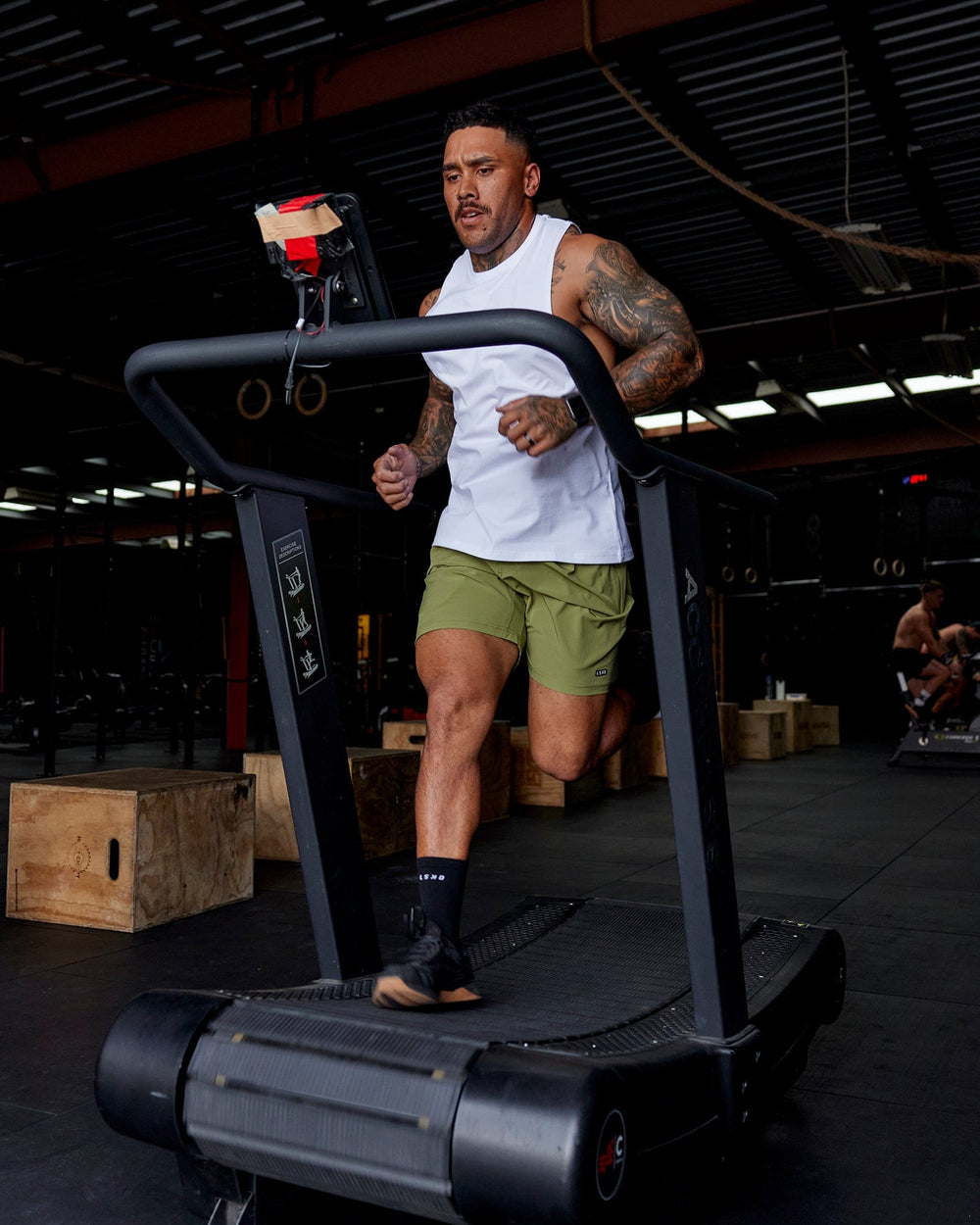 Man wearing Rep 7'' Performance Short - Moss Stone-Lime