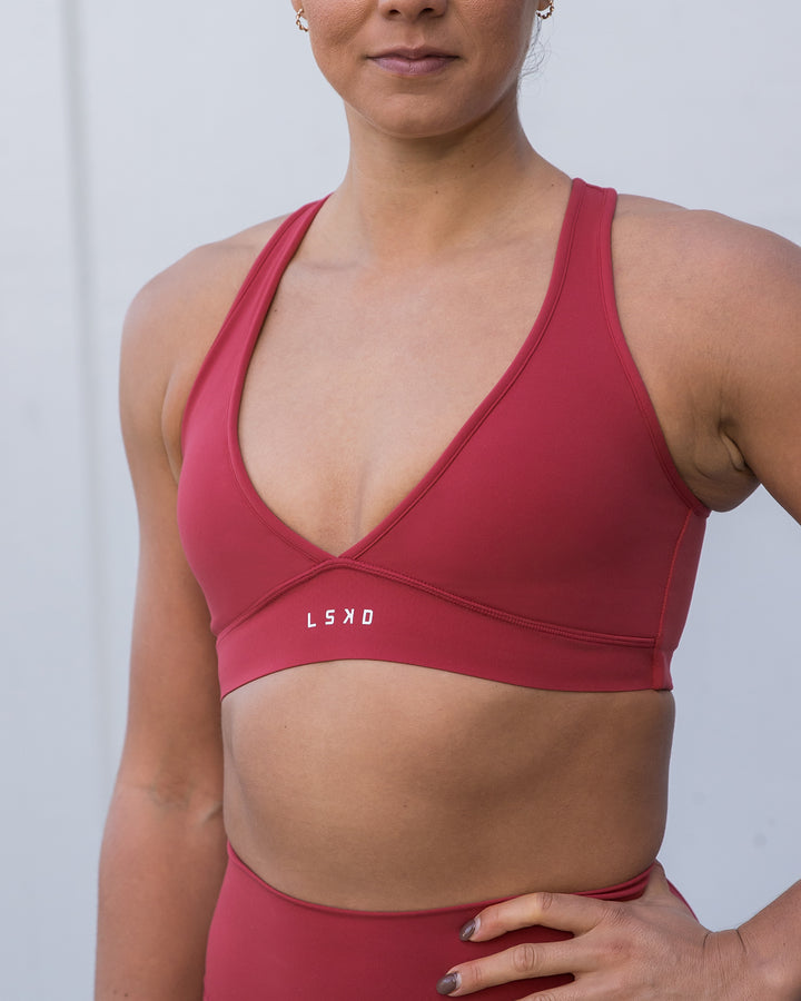 Woman wearing Stamina Sports Bra - Claret
