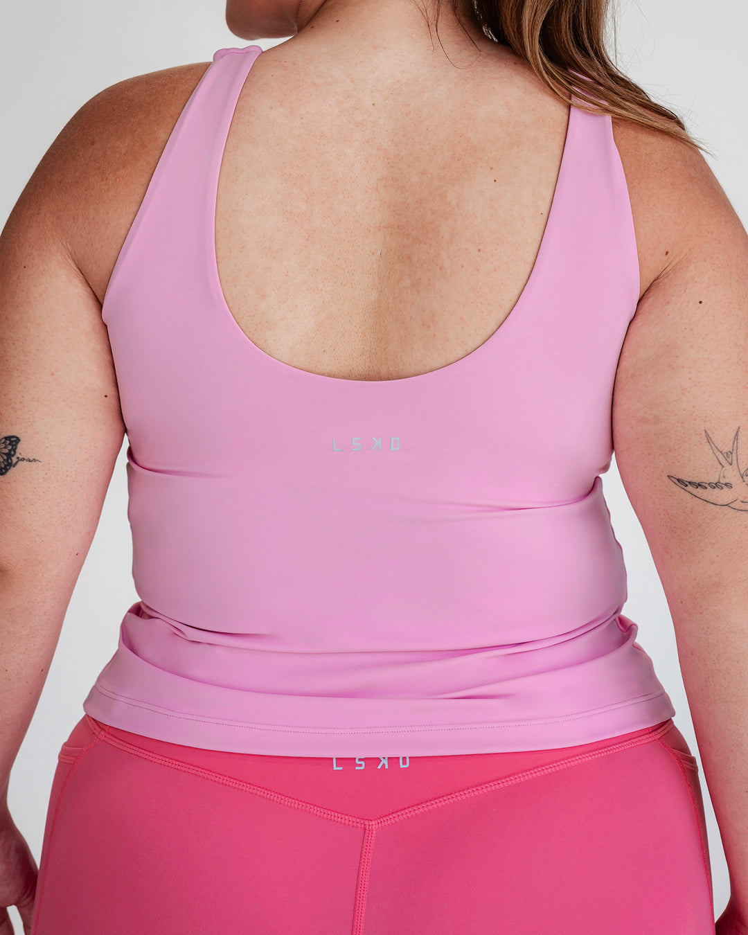 Woman wearing Staple Active Shelf Bra Tank - Bubblegum