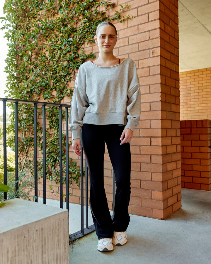 Woman wearing Tempo Sweater - Light Grey Marl
