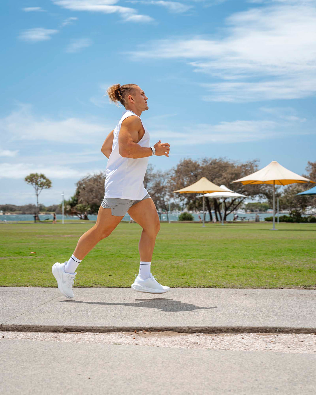 Man wearing UltraAir 5&quot; Lined Performance Shorts - Circular Grey