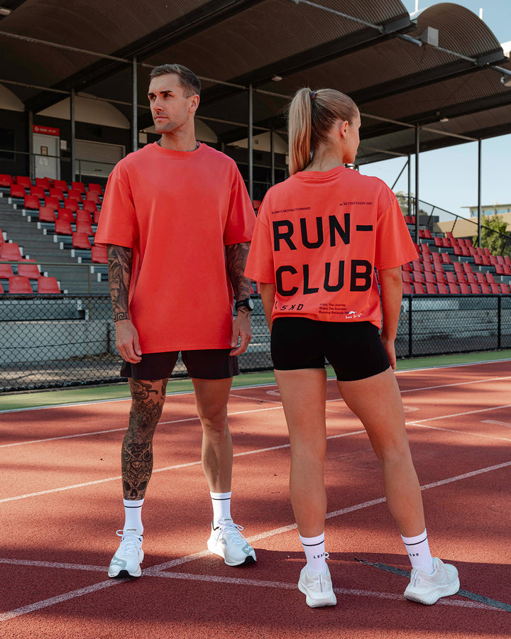 Duo wearing Unisex Love The Run FLXCotton Tee Oversize - Cayenne-Black
