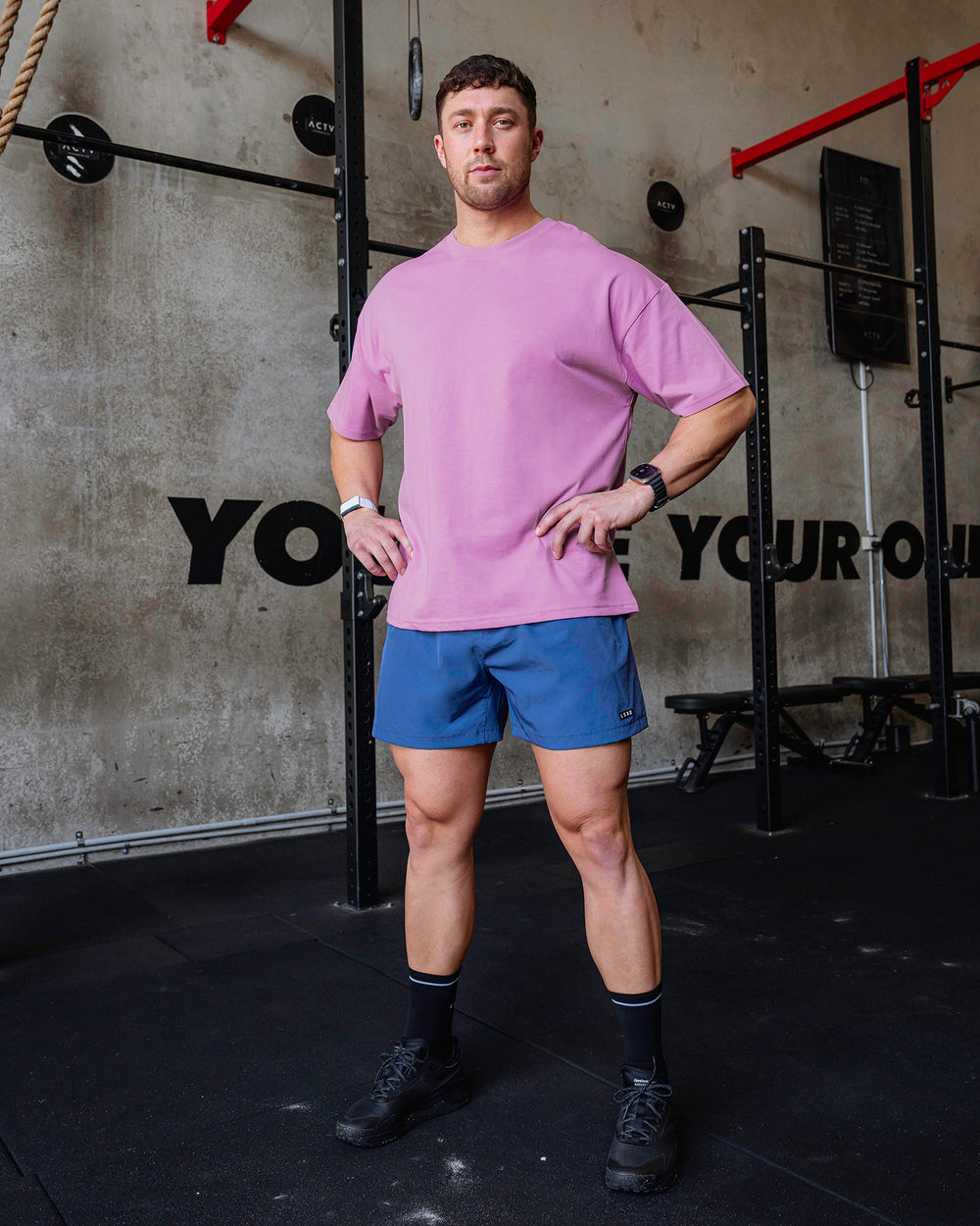 Man wearing Unisex Pressure Heavyweight Tee Oversize - Light Violet-White