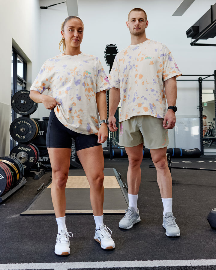 Duo wearing Unisex Washed Huntington 24 Heavyweight Tee Oversize - Tie Dye Tangerine-Dahlia Purple
