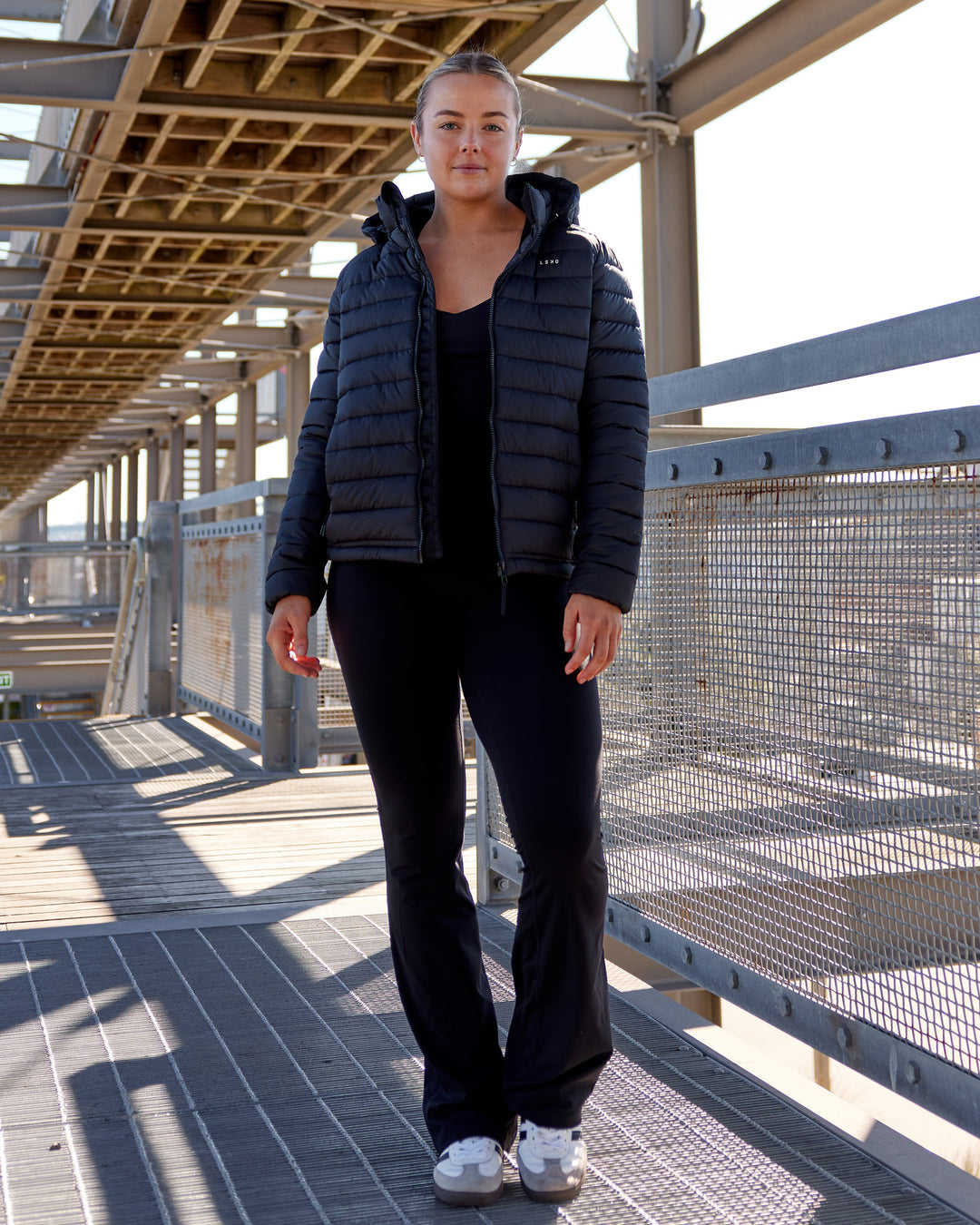 Woman wearing All-day Puffer Jacket - Black