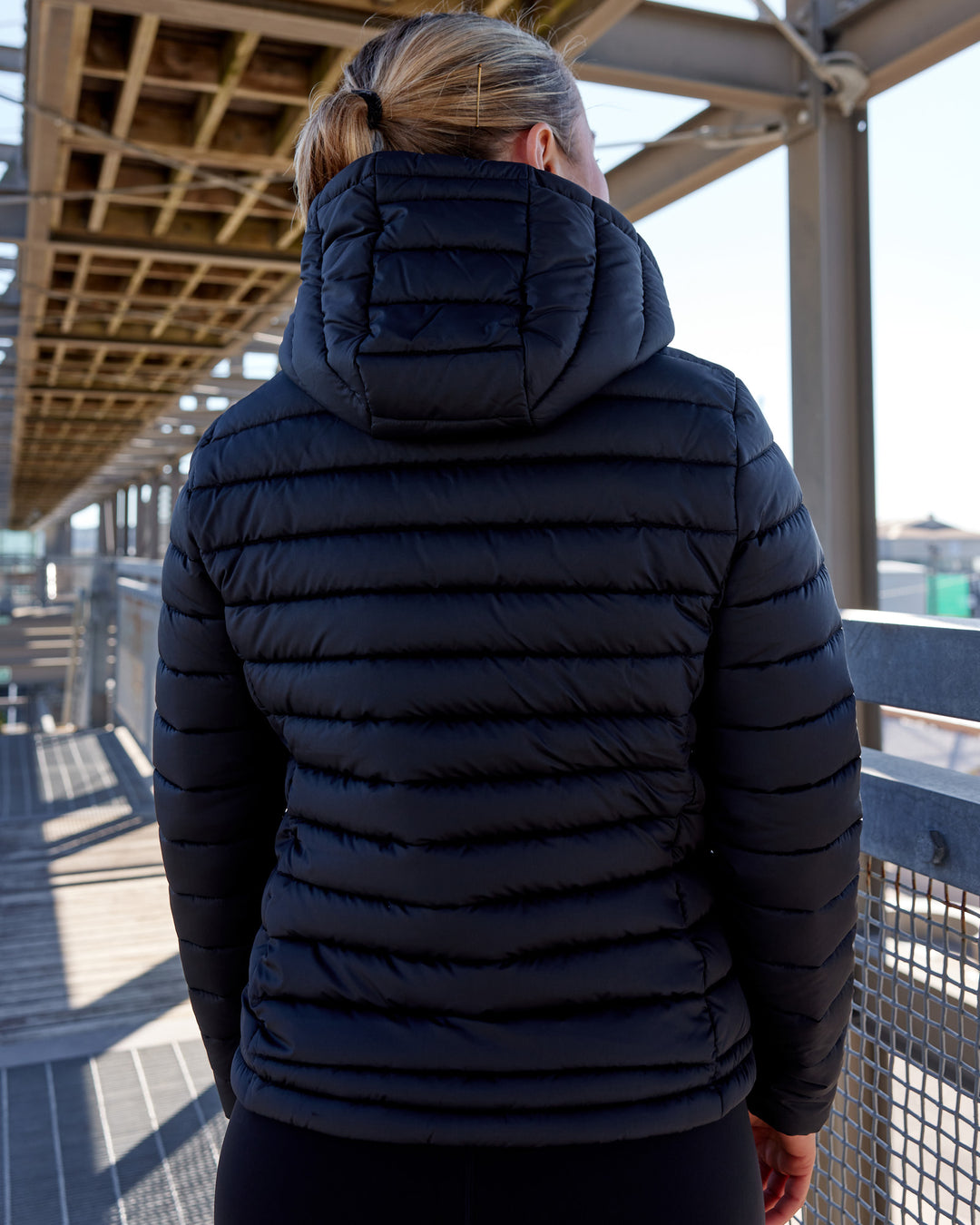 Woman wearing All-day Puffer Jacket - Black