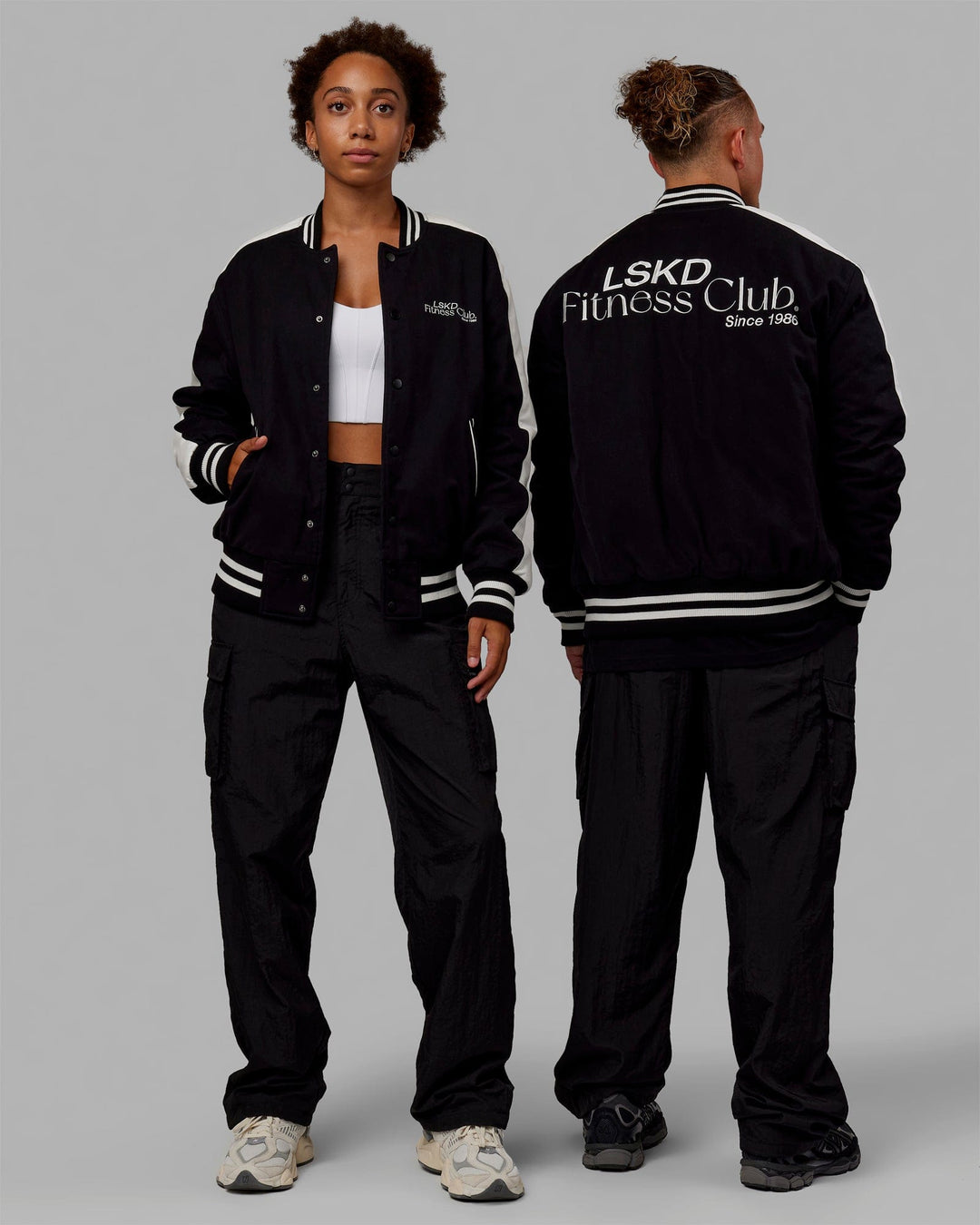 Duo wearing Unisex Fitness Club Bomber Jacket - Black-Off White