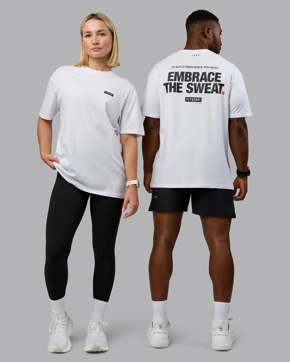 Duo wearing wearing Fitstop Embrace the Sweat FLXCotton Oversized Tee in White-Black | Size:Duo