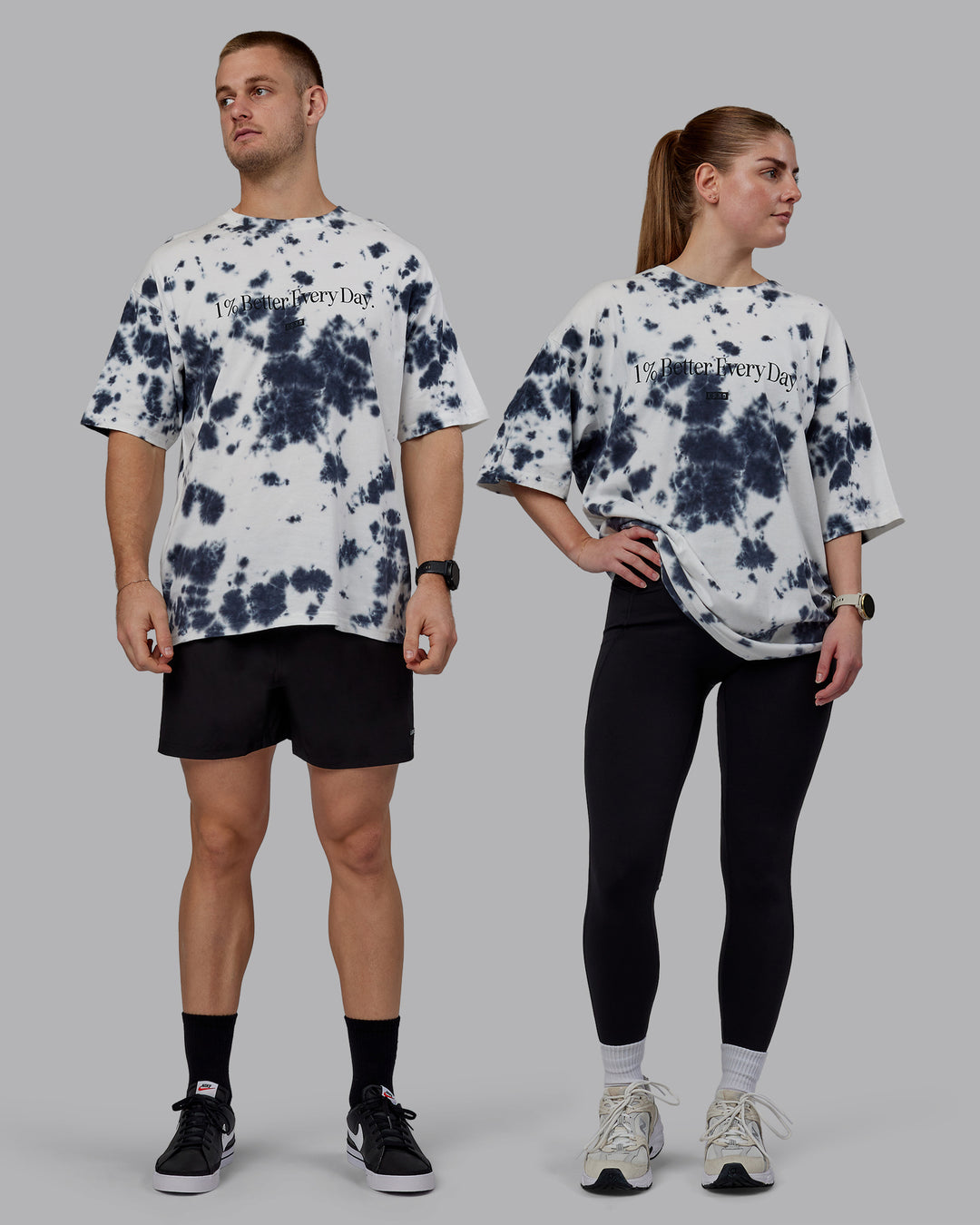 Duo wearing Unisex 1% Better Heavyweight Tee Oversize - White-Black Tie Dye