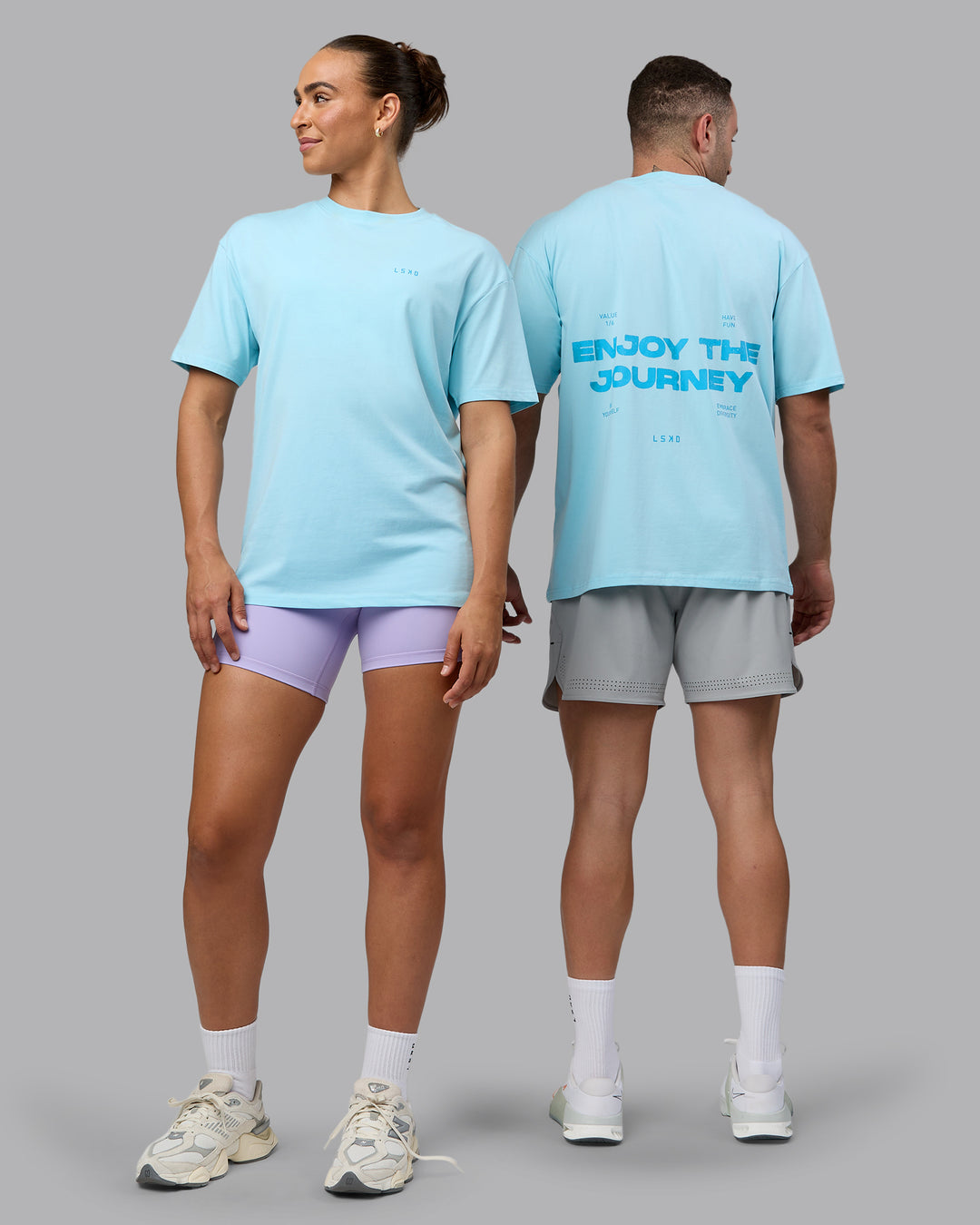 Duo wearing Unisex Enjoy the Journey Value Series FLXCotton Tee Oversize - Crystal Blue-Bay Blue