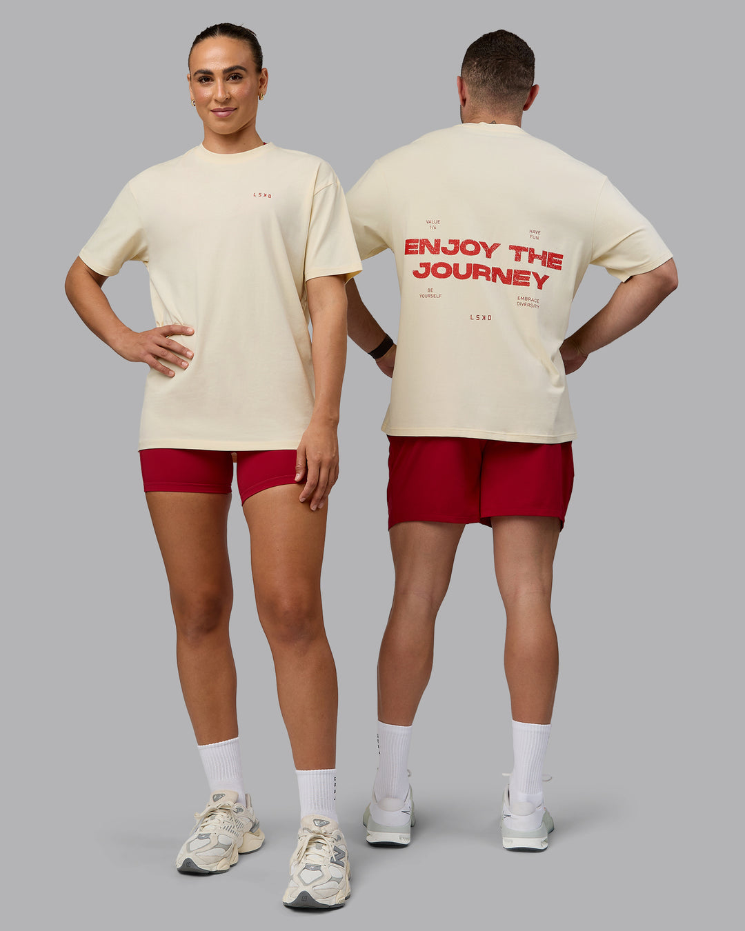 Duo wearing Unisex Enjoy the Journey Value Series FLXCotton Tee Oversize - Ivory-Cherry Red