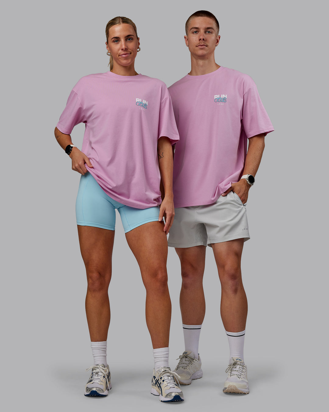 Duo wearing Unisex Gone Running FLXCotton Tee Oversize - Bubblegum-Skyride