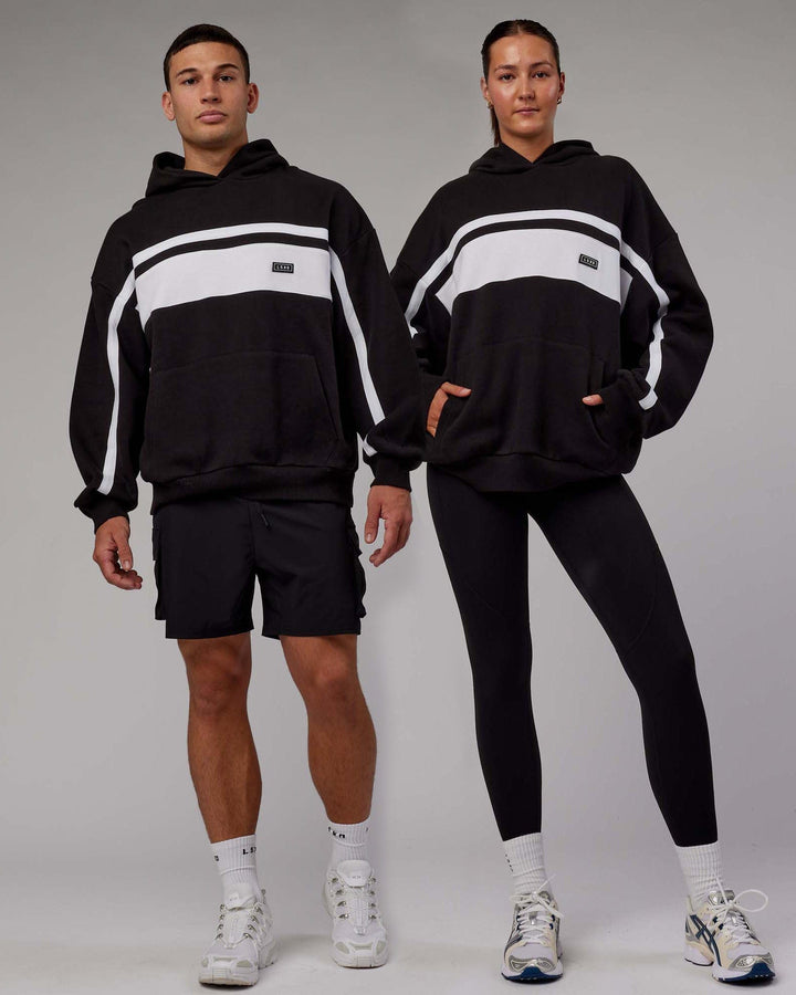 Duo wearing Unisex Intercept Hoodie Oversize - Black-White
