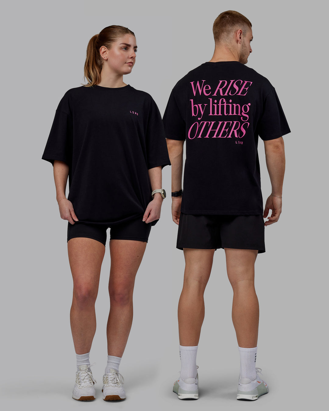 Duo wearing Unisex Lift-Up FLXCotton Tee Oversize - Black-Fuschia Pink