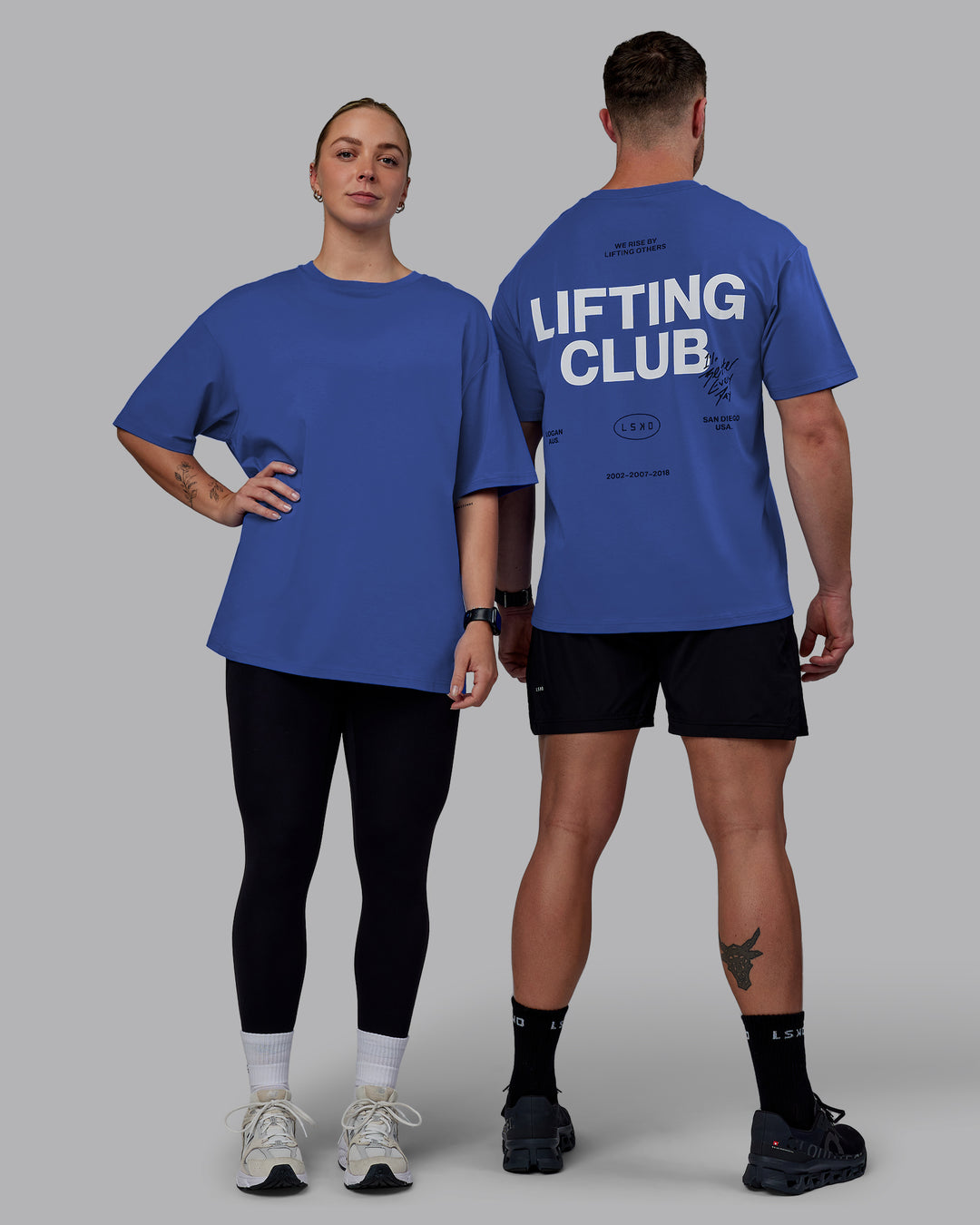 Duo wearing Unisex Lifting Club FLXCotton Tee Oversize - Power Cobalt-White