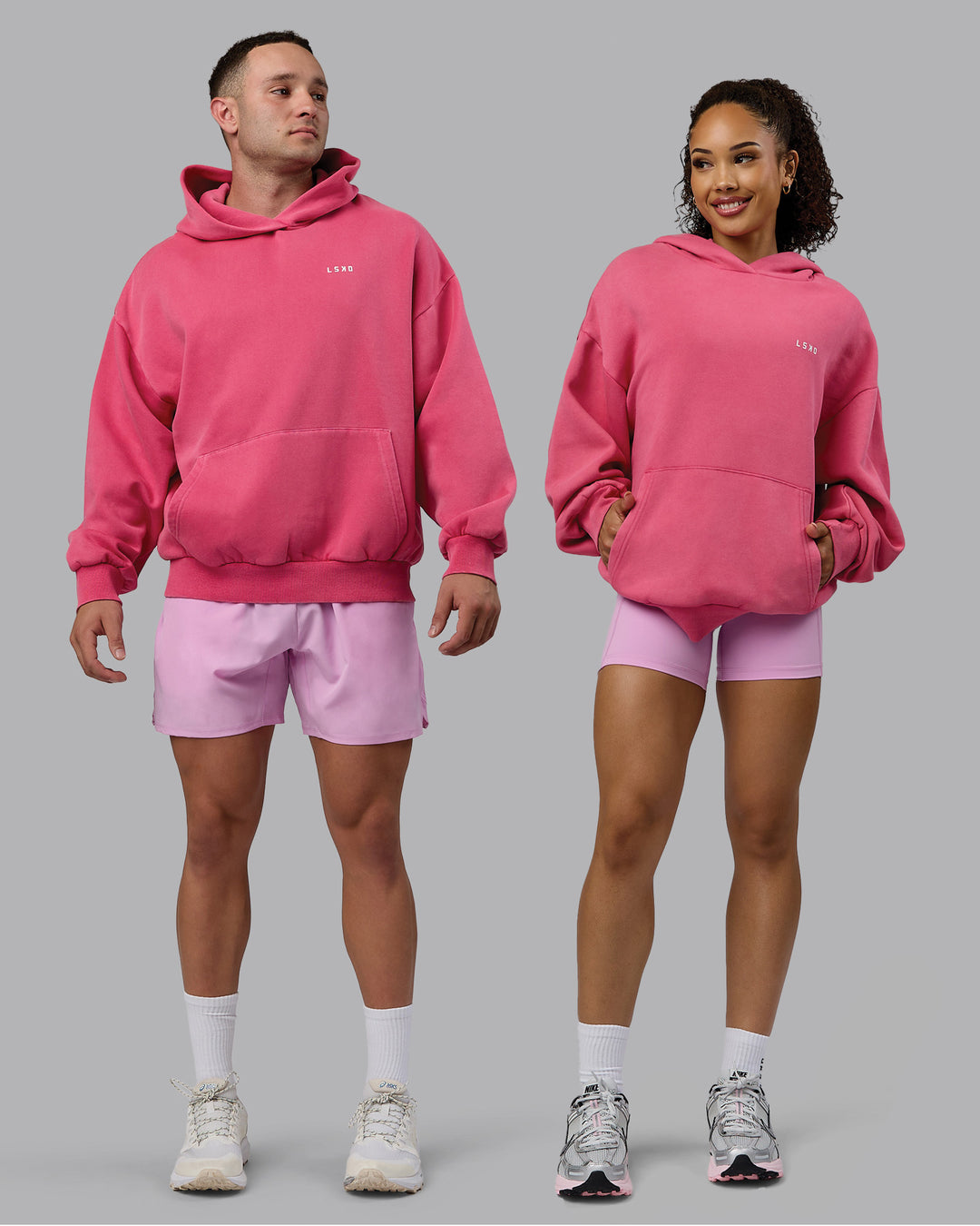 Duo wearing Unisex Washed Empower Hoodie Oversize - Berry Pink-Pastel Orchid