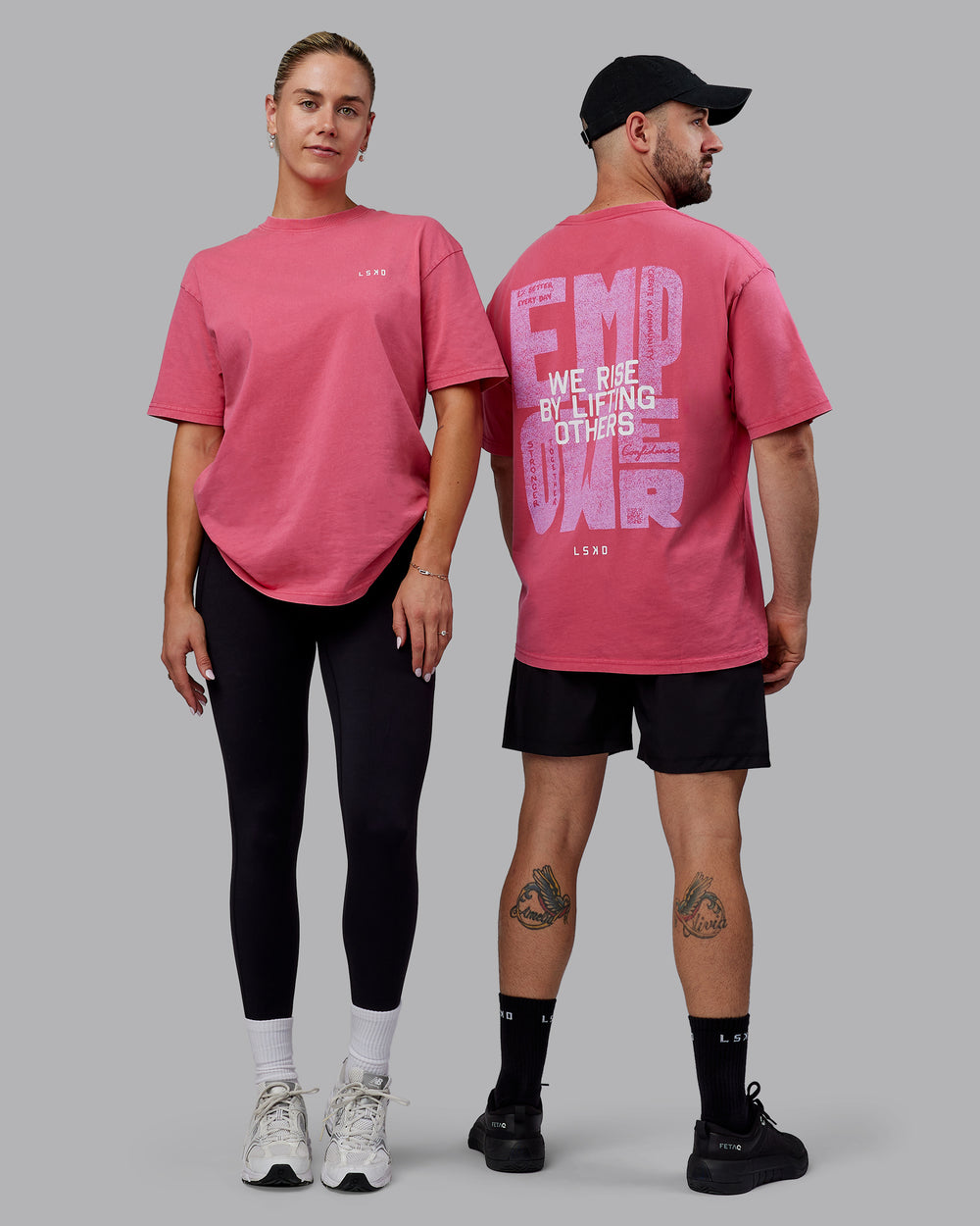 Duo wearing Unisex Washed Empower Tee Oversize - Berry Pink-Pastel Orchid