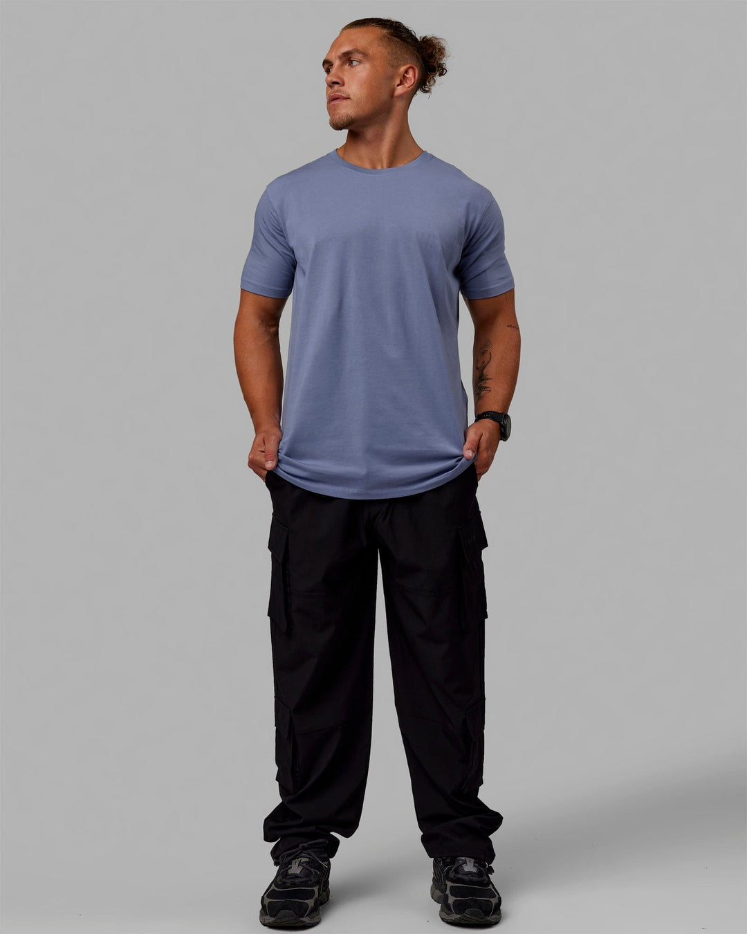 Man wearing Energy Stretch Relaxed Fit Cargo Pants - Black